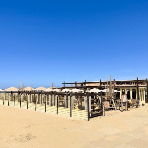 bedrijfsuitje teamuitje groepen strand scheveningen foto strandtent